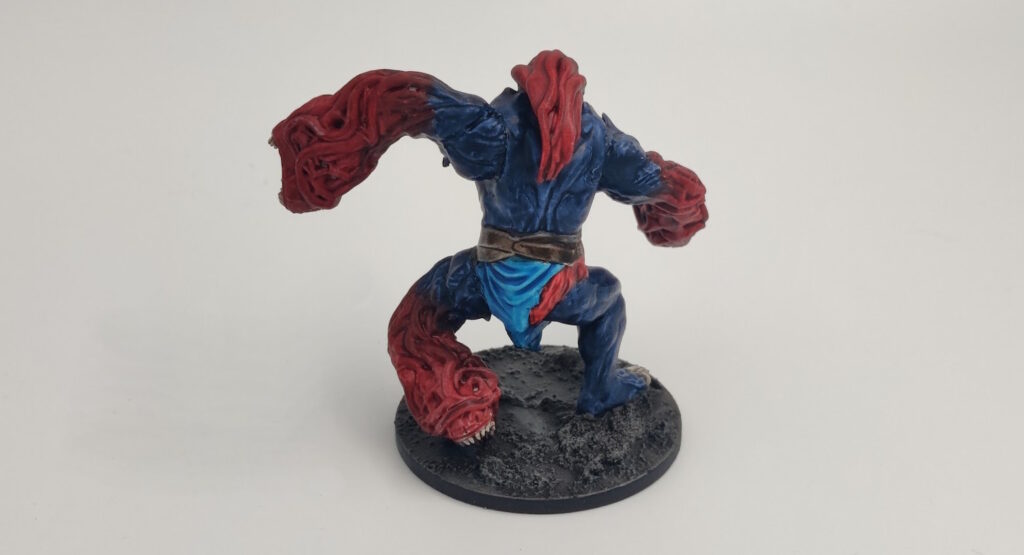 Mantic Ravager. Blue body, red limbs and "hair"